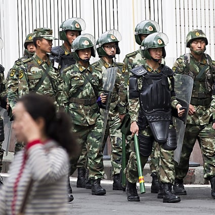 Security has been visibly stepped up in Urumqi, the Xinjiang capital, after the region saw its bloodiest day in five years last Thursday. Photo: AP
