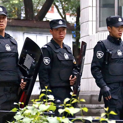 Police in riot gear on patrol in Urumqi, the Xinjiang capital. Photo: Reuters  