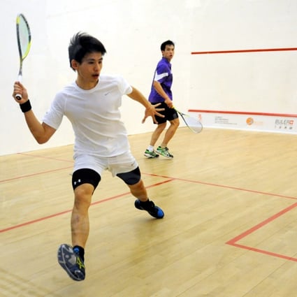 Hong Kong's Max Lee Ho-yin (front) lost in five sets to Ong Beng Hee of Malaysia. Photo: SCMP Pictures