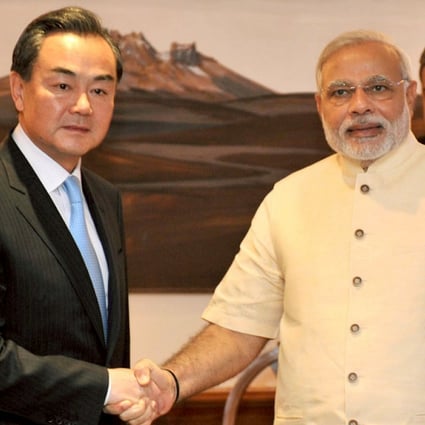 Wang Yi and Narendra Modi meet in New Delhi. Photo: AFP