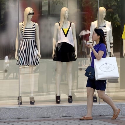 Retail sales on the mainland grew only slightly in May after being affected by a government anti-corruption drive. Photo: EPA