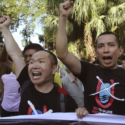 Vientnamese protesters chant anti-China slogans in Hanoi, yesterday after China said it was moving a second oil rig closer to Vietnam's coast. Photo: AP