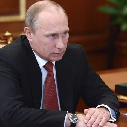 Russia's President Vladimir Putin attends a meeting at the Kremlin in Moscow on Friday. Photo: AFP