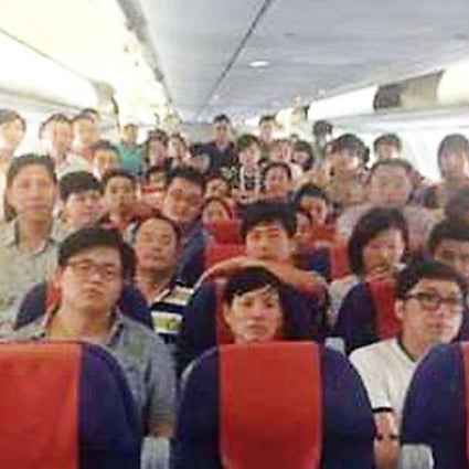 More than 70 passengers staged an 18-hour sit-in on Friday when their Hong Kong Airlines flight to Shanghai was cancelled. Photo: SCMP Pictures