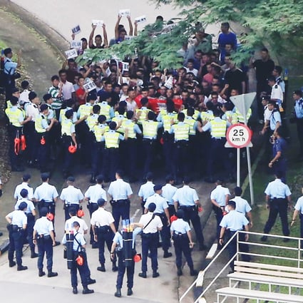 Officers try to control a mock protest at the Police College during an exercise to prepare for Occupy Central. Photo: Felix Wong