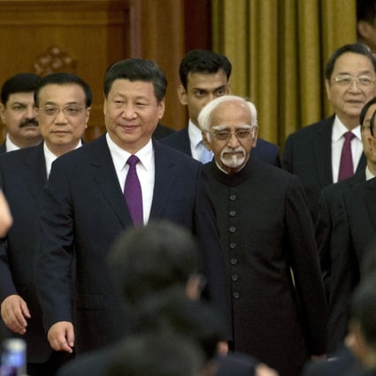 Xi Jinping hosts Hamid Ansari and Thein Sein. Photo: AP