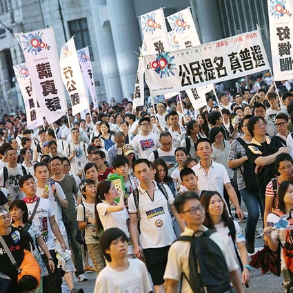 Protesters take to the streets on July 1. Photo: David Wong