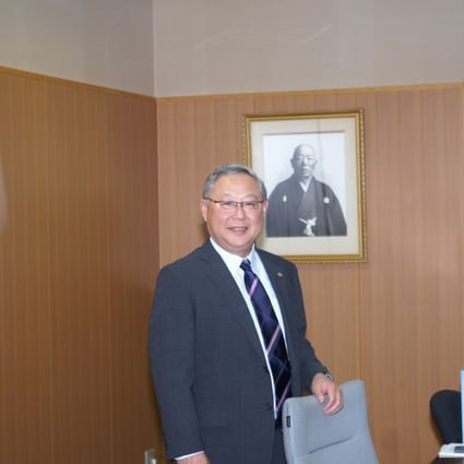 Motonobu Nitta, president