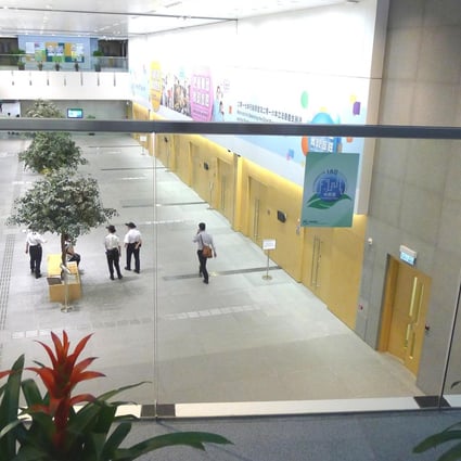 Transparent designs at the central government buildings can leave women wearing skirts vulnerable to peeping Toms, a report says. Photo: SCMP