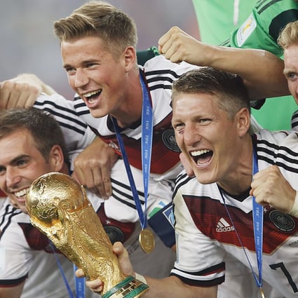 Germany celebrate with the World Cup. Photo: AFP