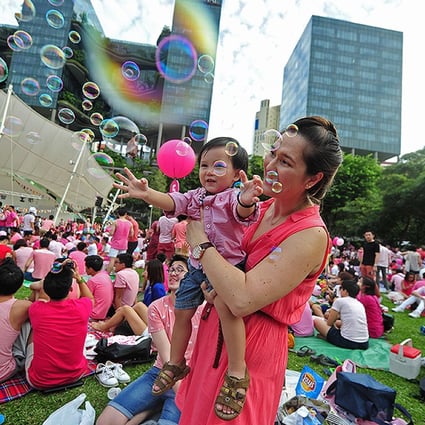 People dressed in pink attend the "Pink Dot" held in Singapore's Hong Lim Park on June 28. Photo: Xinhua