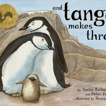 And Tango Makes Three - a true story about two male penguins in a New York zoo that raised a baby penguin- was banned by Singapore's National Library Board as it was deemed pro-homosexual. Photo: AP