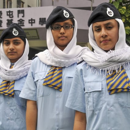 Students at Caritas Tuen Mun Marden Foundation Secondary School wear headscarves.