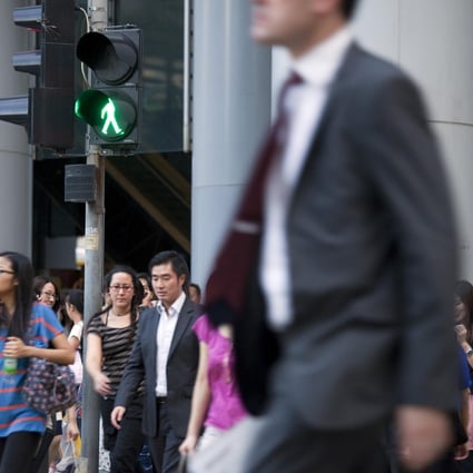Office workers during peak hour in Central. Photo: Bloomberg