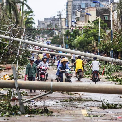 After making landfall in Hainan province, Typhoon Rammasun moved onto Guangdong, where it forced evacuations and downed electricity lines, including in Leizhou (above). Photo: Reuters