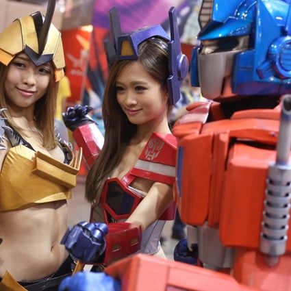 Transformers cosplay girls pose during during the 16th Ani-Com and Games expo. Photo: Sam Tsang