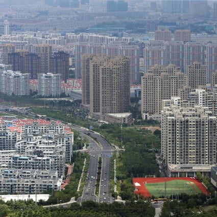New residential buildings in downtown Qingdao city, Shandong province. Property developers are experiencing soaring debt ratios as the downturn in the mainland’s property market continues. Photo: EPA