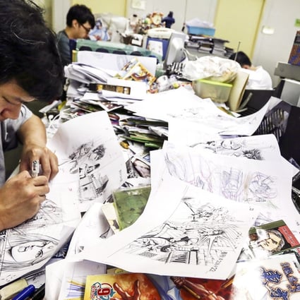 A comic book artist works at the Jade Dynasty office in Heng Fa Chuen. Photo: Jonathan Wong