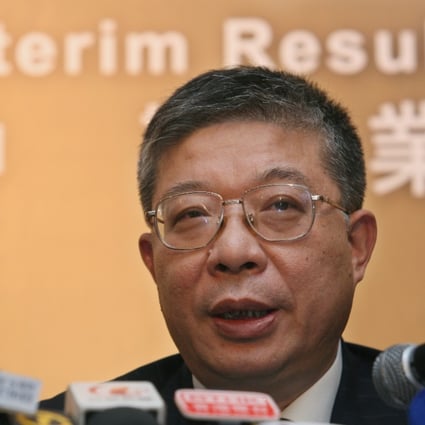 Greentown China's executive vice-chairman Shou Bainian announced the sale of a combined stake of 24.3 per cent to Sunac China for HK$12 per share in cash in May. Photo: David Wong