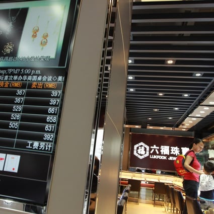 Luk Fook's jewellery shops are seeing more tourists from smaller mainland cities with less purchasing power. Photo: May Tse