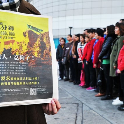A protest against mainland visitors in 2012, with some demonstrators deriding the visitors as 'locusts'. Photo: AFP