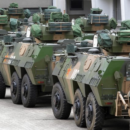 About 20 armoured vehicles are seen at PLA Gun Club Hill Barracks. Photo: Dickson Lee