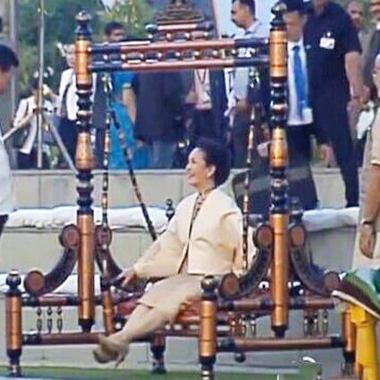 First lady Peng Liyuan on a traditional swing seat in Ahmedabad, where she and her husband, President Xi Jinping, were greeted by India's Narendra Modi. Photo: SCMP