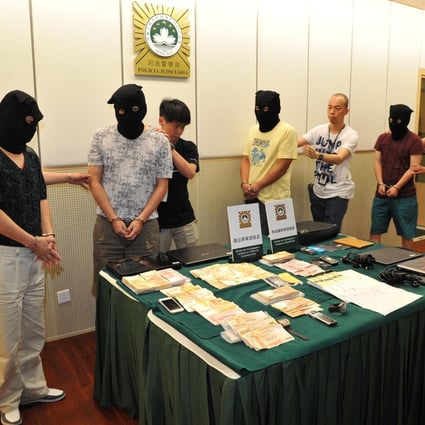 Illegal gambling suspects in Macau. Photo: Imagine China