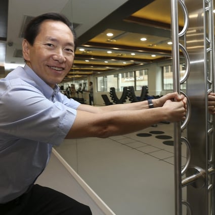 Businessman and politician Bernard Chan works out at his exercise facility that is aimed at helping the elderly keep fit and remain engaged with the community. Photo: K. Y. Cheng