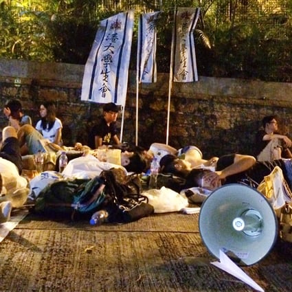 Demonstrators outside Government House in the early hours of Friday. Photo: Samuel Chan
