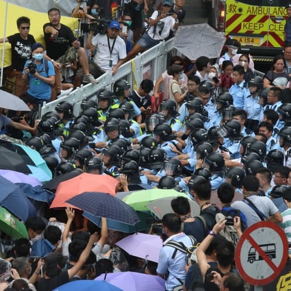 Demonstrators clash with police in Admiralty. Photo: K. Y. Cheng

 
