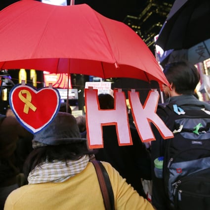A few hundred people gather in New York's Times Square to show solidarity with Hong Kong protesters. Photo: AP