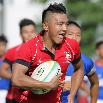 Eric Kwok Pak-nga spots a gap as he runs in try number six for Hong Kong against Taiwan in the ARFU Asian qualifiers for the 2015 IRB Junior World Rugby Trophy. Hong Kong won the match 44-5. Photo: Dennis Muthuthantri for HKRFU