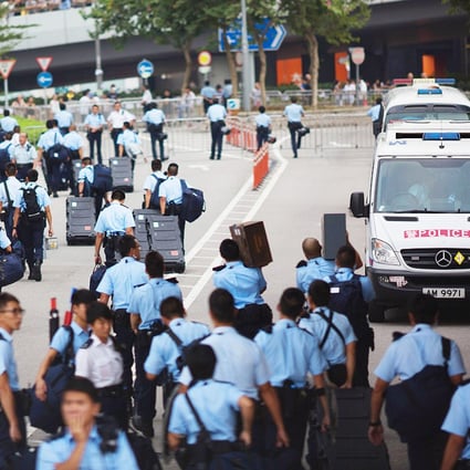 Police officers are frequently moved to tears by unprecedented emotional pressure in handling the Occupy Central movement, the force's psychologists say. Photo: Bloomberg