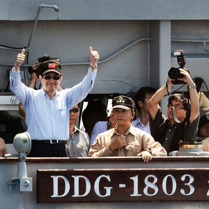 Taiwan President Ma Ying-jeou gestures from a US-made naval destroyer during a drill at sea in September. Photo: AFP