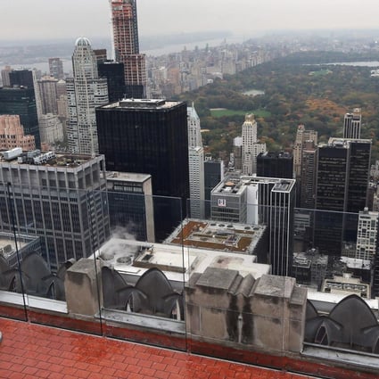 Buying property in countries such as the United States should no longer require approval. Photo: AFP