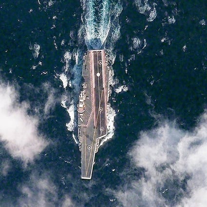 China's first aircraft carrier, the Liaoning, undergoes trials in the Yellow Sea. Photo: Reuters