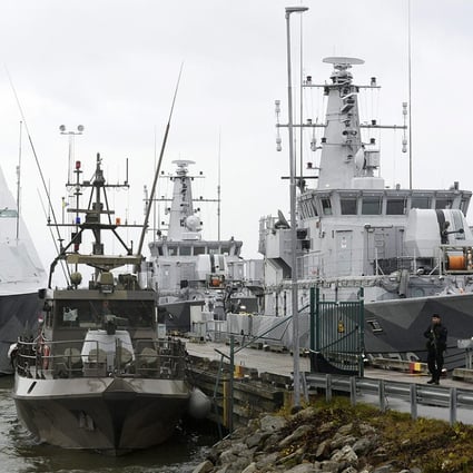 Swedish naval vessels lie moored at the jetty at Berga marine base outside Stockholm earlier this week. Photo: EPA