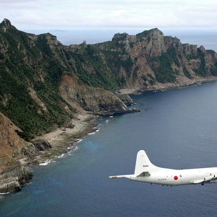 A Japanese surveillance plane flies over the Diaoyu Islands. Photo: AP
