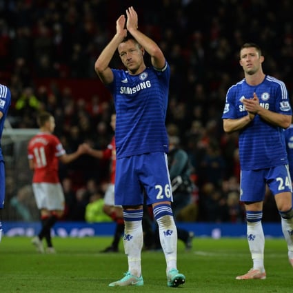Chelsea captain John Terry was far from happy with the performance of referee Phil Dowd at Old Trafford on Sunday night. Photo: AFP