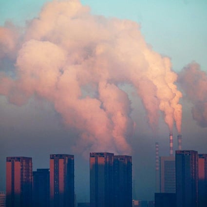 A power plant pollutes the air over Changchun, in northeastern Jilin province. The health and environmental costs of coal use add up to HK$330 per tonne. Photo: AFP
