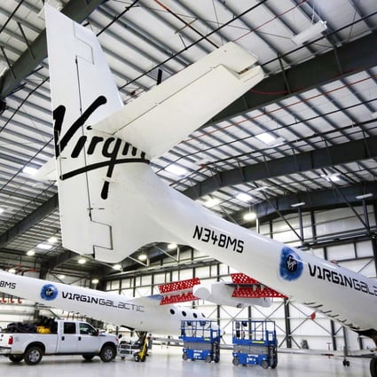 Virgin Galactic's WhiteKnightTwo carrier aircraft mothership, which landed safely after splitting from SpaceShipTwo, is seen in a hangar at Mojave Air and Space Port in Mojave, California. Photo: Reuters