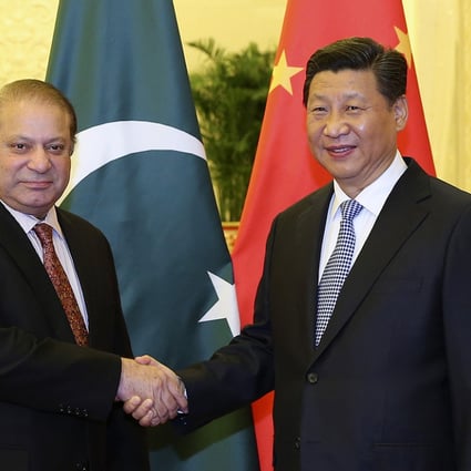 Pakistan's Prime Minister Nawaz Sharif shakes hands with China's President Xi Jinping during their meeting on Saturday in Beijing. Photo: Xinhua 