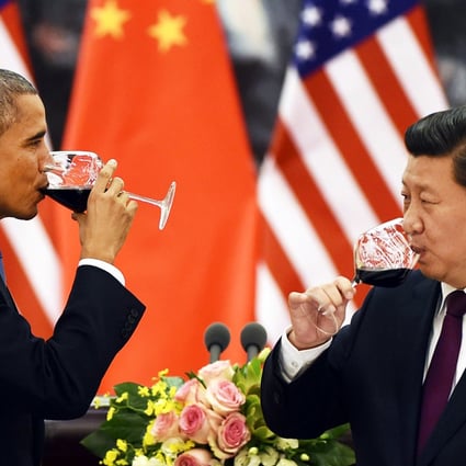After two days of intense negotiations, Barack Obama and Xi Jinping share a toast at the Great Hall of the People in Beijing. They reached agreement on a host of issues including climate change. Photo: AFP
