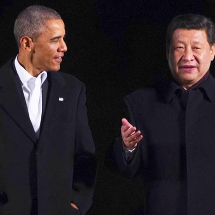 Presidents Barack Obama and Xi Jinping chat informally as they take a stroll at the Zhongnanhai leaders compound in Beijing before enjoying a private dinner. Photo: AFP
