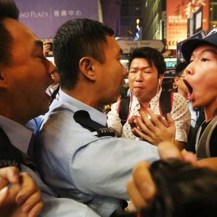 Protesters and police clash in Mong Kok. Photo: Felix Wong