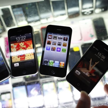Fake iPhones on sale in Shanghai typify China's copycat prowess, but a forecast wave of innovation could change that image. Photo: Reuters