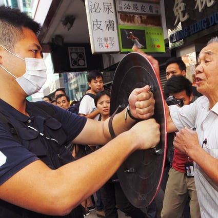 Protesters clash with each other in Mong Kok. Photo: Edward Wong