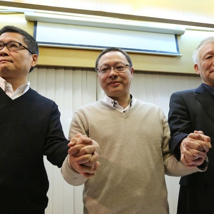 Occupy Central co-founders Dr Chan Kin-man, Benny Tai Yiu-ting and Reverend Chu Yiu-Ming, meet the media to urge students to go home as they vow to hand themselves in to police tomorrow. Photo: Sam Tsang