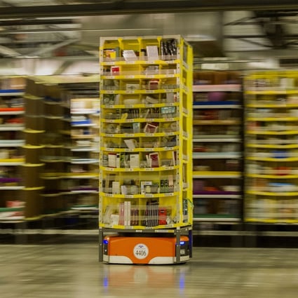 Amazon.com has installed more than 15,000 robots across 10 US warehouses, a move that promises to cut operating costs by one-fifth and get packages out the door more quickly in the run-up to Christmas. Photo: Bloomberg